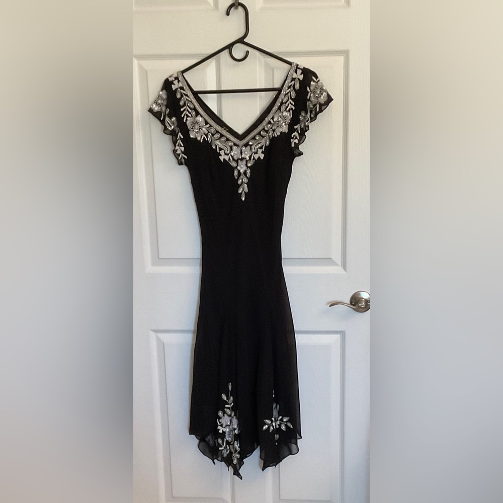 Beautiful dress with stunning details.